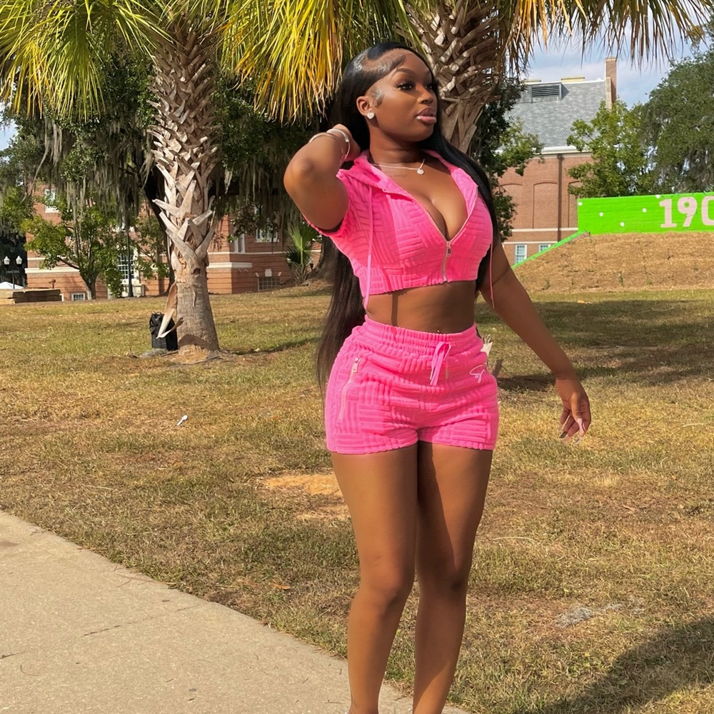 Shane justin hoodie and shorts set in the color pink size medium.